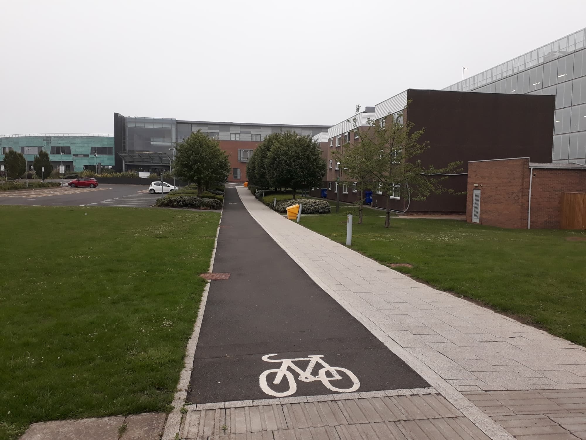 Footpaths and lawns in front of buildings at the Freeman Hospital, Newcastle upon Tyne, England, June 17, 2020. Illustrative image of the hospital, not of Mr. Hasan, his patients or the awards ceremony. Photo: Graham Robson, CC BY-SA 2.0, via Geograph and Wikimedia Commons. Source page: https://commons.wikimedia.org/wiki/File:Paths,_Freeman_Hospital,_Newcastle_upon_Tyne_-_geograph.org.uk_-_6528879.jpg